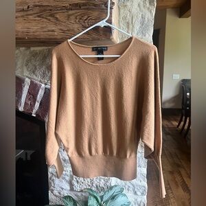 Women’s long sleeve camel colored sweater, size small.